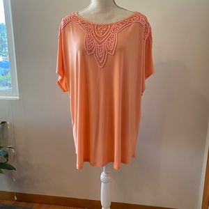 Short sleeve embroidered neckline only worn once.